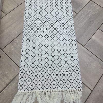 Cream and black woven floor mat long