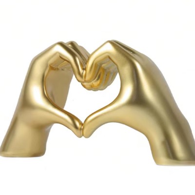 Gold hand heart 