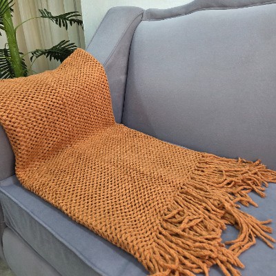 Knitted throw blanket rust dots 