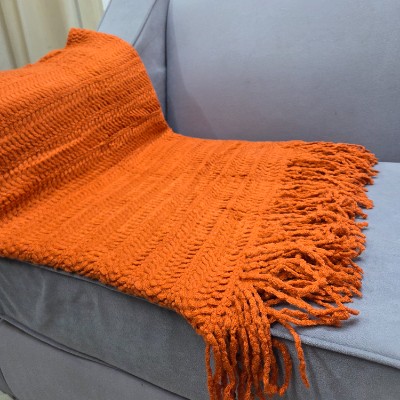 Knitted throw blanket shade of Terracottar